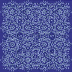 Openwork pattern of white color on a blue background