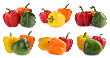 Set of different ripe bell peppers on white background