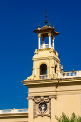 Fototapeta na wymiar Tower at Palaus d'Alfons XIII i de Victoria Eugenia in Barcelona, Spain