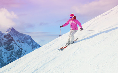 woman skiing  in the mountains