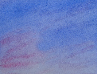 Watercolor abstract blue and pink sky background. Hand drawn watercolor painting..