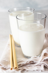 Homemade kefir. Organic probiotic kefir drink or yogurt with probiotics in glasses. Probiotic cold fermented dairy drink. Trendy food and drink. 