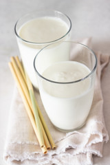 Homemade kefir. Organic probiotic kefir drink or yogurt with probiotics in glasses. Probiotic cold fermented dairy drink. Trendy food and drink. 