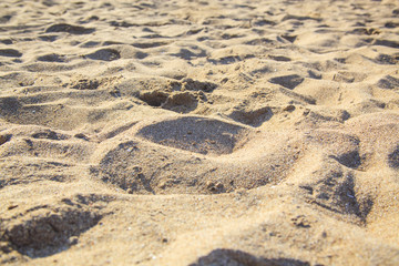 Sand pattern on the beach in the summer time.