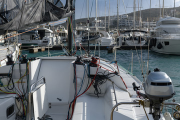 White motor yacht moored in marina at day time