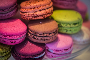 mix french macaroons close up view with different flavours & colours