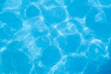 Fototapeta na wymiar Water with small waves in the pool