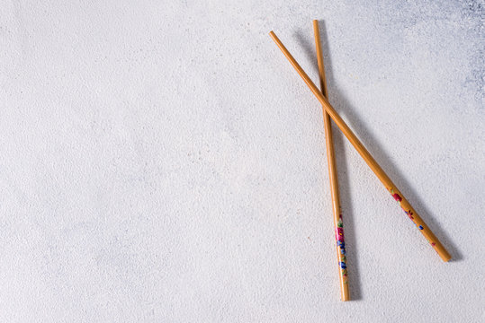  Food sticks. Wooden Chinese chopsticks for Asian dishes, bamboo sticks oriental food
