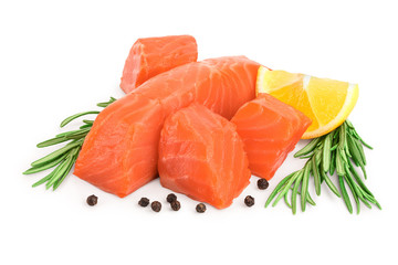 raw salmon piece cube with rosemary, lemon and peppercorn isolated on white background close up