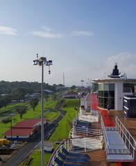 Passengers watch Celebrity Cruises cruiseship or cruise ship liner entering a lock at the Panama...