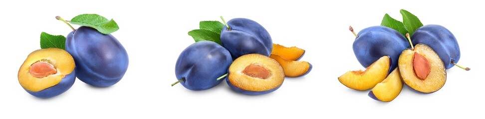 fresh blue plum with leaves isolated on white background. Set or collection