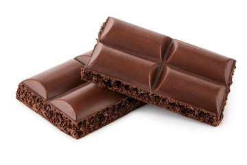 Small dark chocolate pieces isolated on white background with clipping path