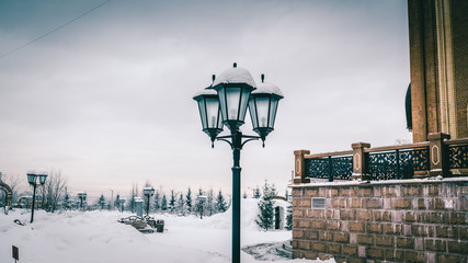 Night lanterns in the snow