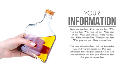 bottle cognac alcohol in hand on a white background. Isolation, space for text