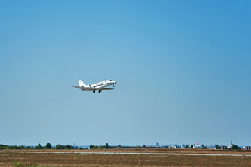 Fototapeta na wymiar take-off and landing of passenger aircraft at the airport. kharkiv plane spotting day