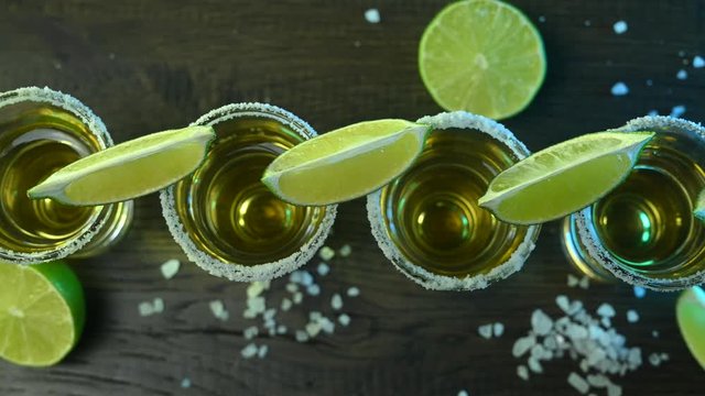glasses with telly and salt are on a bar