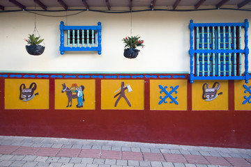 Detail from colorful facade on the building in Guatape, Colombia