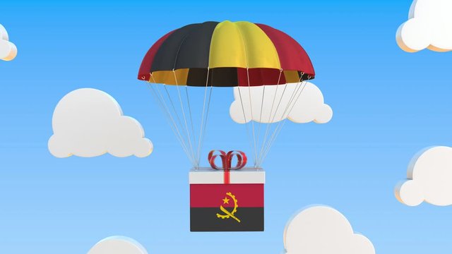 Box with national flag of Angola falls with a parachute. Loopable conceptual 3D animation