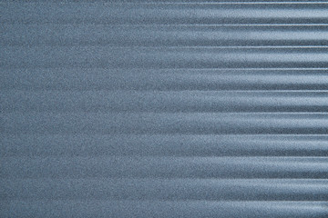 Metal background. Silver background of corrugated metal, texture.