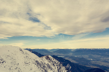 Mountain view from late snow covered ridge.