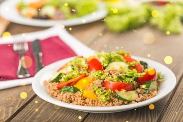 Greek salad with fresh vegetables on desk