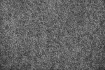 Texture of gray material. Graphite fabric background.