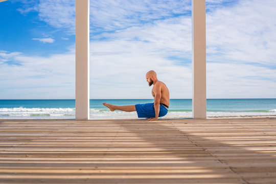 Sportsman training at the beach