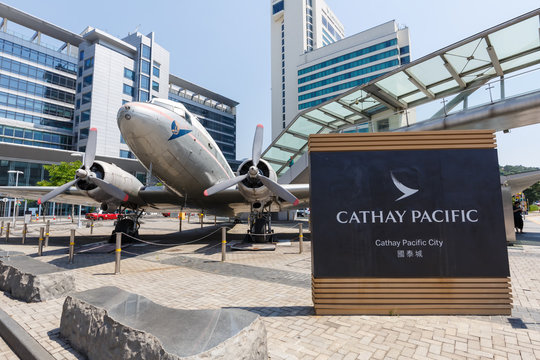 Cathay Pacific City headquarters with Douglas DC-3 airplane Hong Kong airport