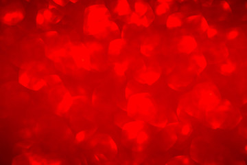 Valentine's day. Red Festive Christmas Beautiful abstract Blurred Background with bokeh lights. Holiday Background with copy space. Wide screen, defocused