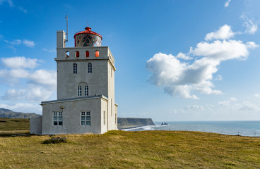 Fototapeta na wymiar Dyrholaey lighthouse on southcoast of Iceland