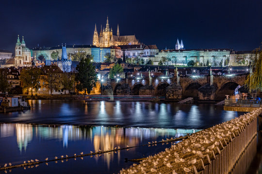 Czech Republic, Prague, Prague Castle and surrounding buildings seen from Charles Bridge at night