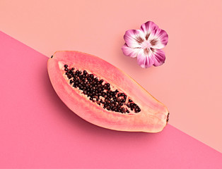 Fresh Papaya tropical Fruit. Bright pink Sweet Color. Flat lay. Trendy fashion Style. Minimal. Hot fashionable Summer Vibes. Orange papaya fruit, Surreal. Detail, Pop Art