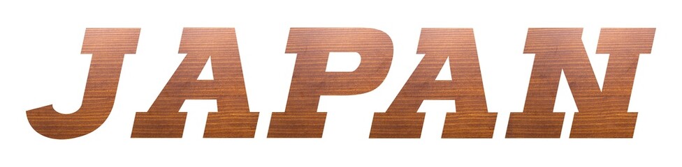 JAPAN word with brown wooden texture on white background.