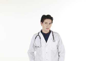 the young asian medical doctor and his stethoscope at isolated white background copy space 