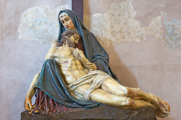 PRAGUE, CZECH REPUBLIC - OCTOBER 14, 2018:  The detail of the statue of Pieta in church of St....