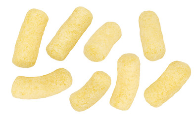 A few yellow, crunchy corn snacks on white background