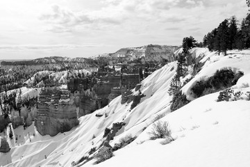 Amazing Bryce Canyon National Park landscape in monochrome. Scenic view with amphitheater covered by snow from Inspiration Point. Bryce Canyon National Park, Utah, Southwest USA.