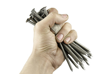 Man holding construction nails in his hand on a white isolated background