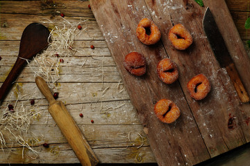 Bread on a wooden background in the rustic style