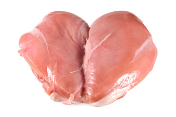raw chicken fillets close up on white