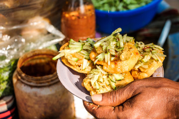 Asian bangladeshi Indian street food velpuri or in india name pani puri. it is very spicy colorful....