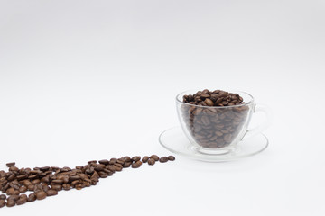Fototapeta na wymiar Coffee concept, coffee beans in a glass cup