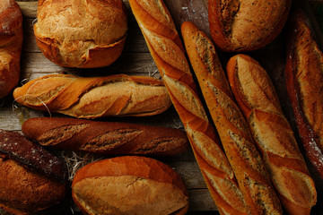 Bread on a wooden background in the rustic style