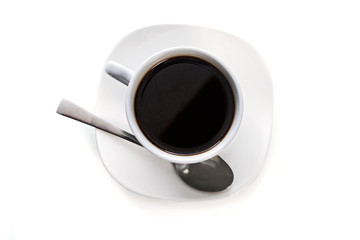 Top view of a cup of coffee with spoon isolated on a white background