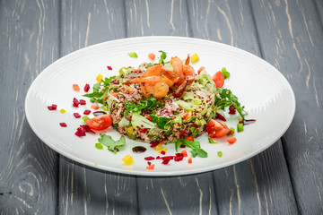 Fresh salad with vegetables, sprouted grains and shrimp