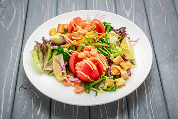 Seafood Caesar Salad with Shrimps, Salad Leaf, Croutons, Cherry Tomato and Cheese