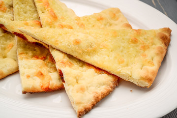 pita bread on wooden board