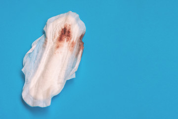 Used sanitary pad with natural blood. Woman on critical days, gynecological menstrual cycle....