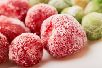 Close-up of frozen food strawberry with Brussels sprouts