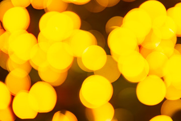 Gold yellow abstract background with bokeh defocused blurred lights